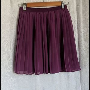 Purple pleated pull on skirt